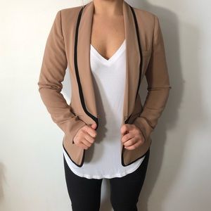 Fitted tan blazer with black trim